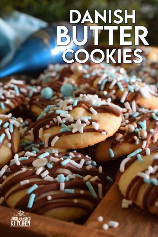 Melt in your mouth Danish Butter Cookies taste just like those cookies in the blue tin at your grandma's house. These are drizzled with milk chocolate, because everything at Christmastime should be over the top! #danish #butter #cookies #christmas #holiday #baking #dansk