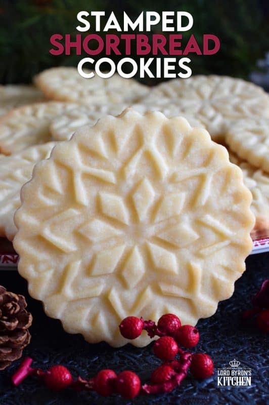 A perfect treat for anyone at anytime; Stamped Shortbread Cookies are buttery and delightfully bright and vibrant to match the holiday season! Using a cookie stamp is a great way to make a simple, homemade shortbread a beautiful cookie! #shortbread #cookie #stamp #stamped #christmas #holiday #baking
