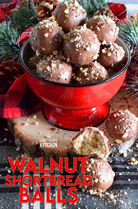 For this cookie, I've taken a shortbread recipe, stuffed it with chopped walnuts, baked them into balls, and dipped them in melted chocolate. Walnut Shortbread Balls are a new take on a Christmas classic! #walnut #shortbread #chocolate #balls #christmas #holiday #baking