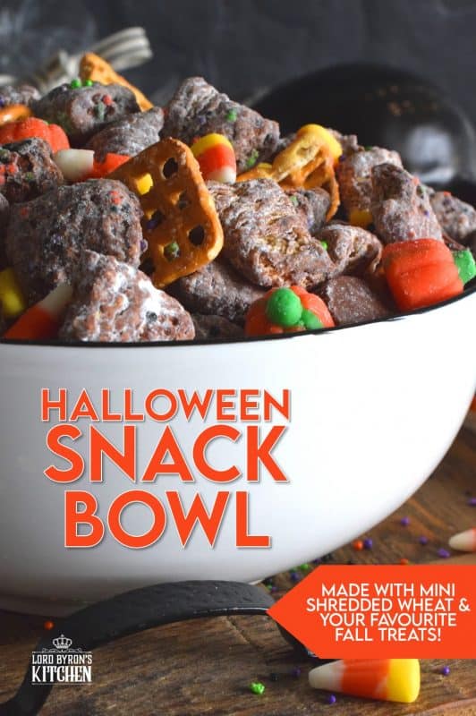 Assemble this Halloween Snack Bowl and friends can help themselves to a tasty treat at your party, or scoop the mixture into cellophane bags and tie them up with a festive ribbon. A homemade treat like this would be much more appreciated by your local trick or treaters! #trickortreat #snackbowl #halloween #halloweenrecipes #chexmix #shreddies