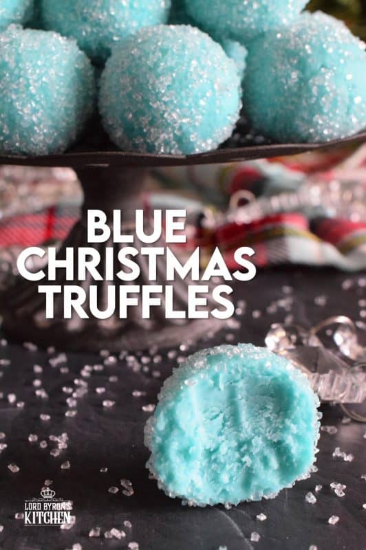 Blue Christmas Truffles are prepared with a white chocolate ganache base. The beautiful colour comes from the addition of blue curacao, which creates a warming sensation as these melt in your mouth. White chocolate and a hint of citrus is what you get with these treats! #bluechristmas #truffles #nobake #ganache #whitechocolate #curacao