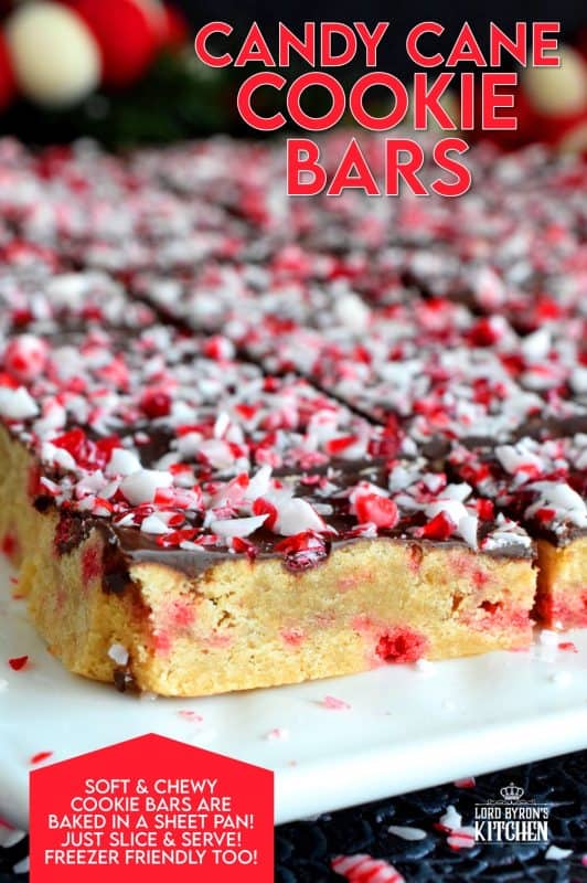 Soft and moist Candy Cane Cookie Bars, which are baked in a sheet pan, then smeared with melted chocolate, and topped with more crushed candy canes, is bound to be a new holiday favourite! These make holiday baking fun and easy! #candycane #cookies #cookiebars #christmas #holiday #baking