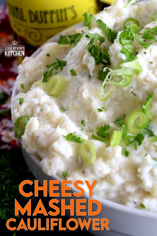 A mashed potato substitute that's health conscious and free of butter and heavy cream. Cheesy Mashed Cauliflower is creamy, flavourful, and delicious without all of the calories and extra fat. The addition of fresh green onions adds a crisp, refreshing taste. #cauliflower #creamcheese #mashedcauliflower #potatoalternative #mashed #thanksgiving #sidedish