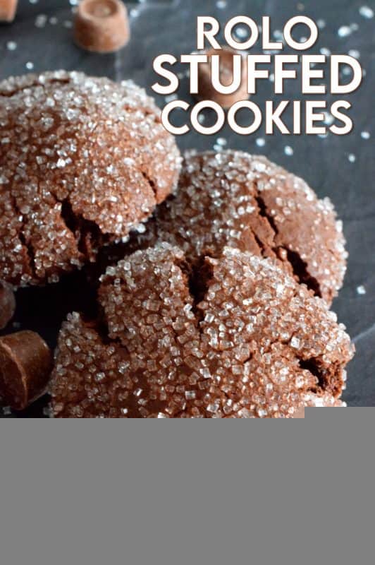 For the ultimate chocolate lover, these Rolo Stuffed Cookies are prepared with a rich chocolaty and fudgy base, which is wrapped around a single Rolo candy. When you bite into one of the cookies, milk chocolate and caramel oozes out - sounds indulgent, right? Perfect for Christmastime, when calories don't count! #christmas #holiday #baking #cookies #rolo #stuffedcookies #caramel #chocolate