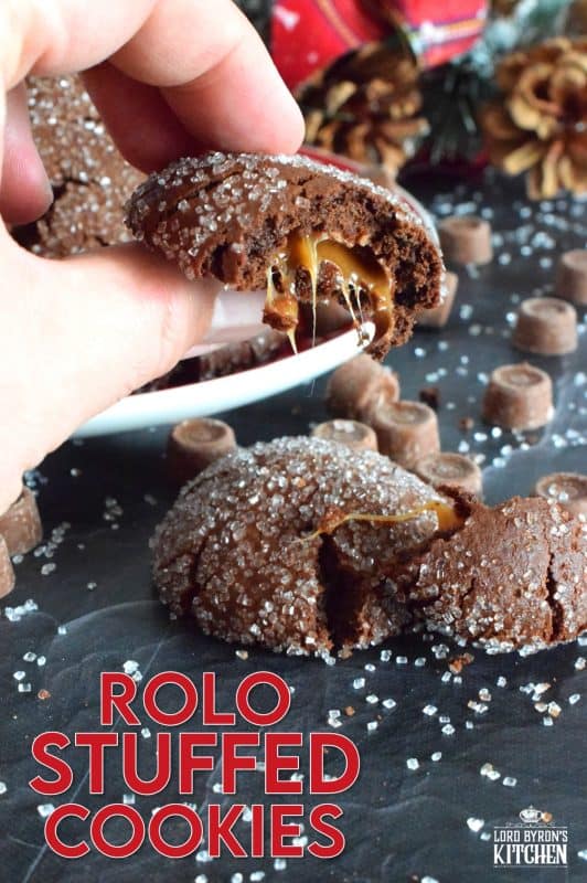 For the ultimate chocolate lover, these Rolo Stuffed Cookies are prepared with a rich chocolaty and fudgy base, which is wrapped around a single Rolo candy. When you bite into one of the cookies, milk chocolate and caramel oozes out - sounds indulgent, right? Perfect for Christmastime, when calories don't count! #christmas #holiday #baking #cookies #rolo #stuffedcookies #caramel #chocolate