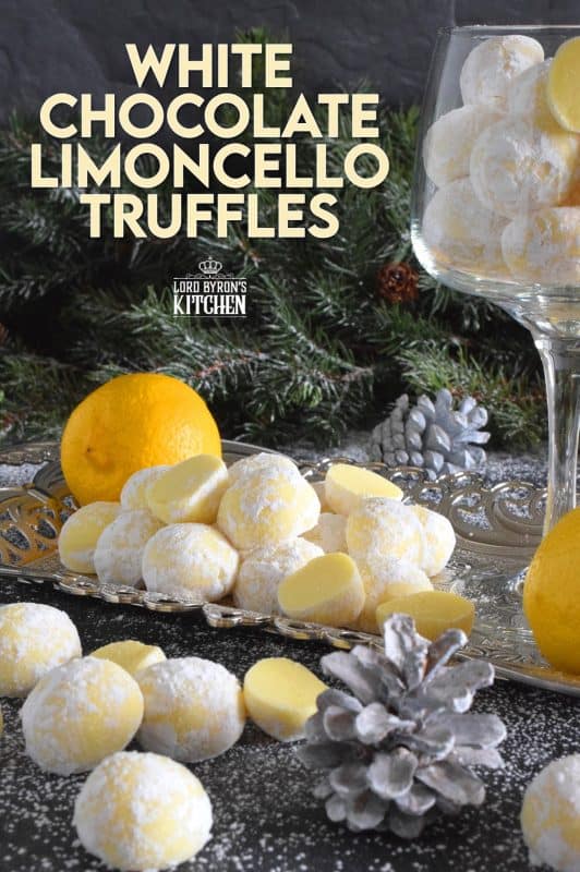 If you love lemon, White Chocolate Limoncello Truffles will make you a very happy person! Prepared with white chocolate, lemon zest, and limoncello liqueur, these truffles are perfectly sweet and sour. These pale yellow delights will melt in your mouth! #christmas #whitechocolate #holiday #nobake #truffles #limoncello #boozy 