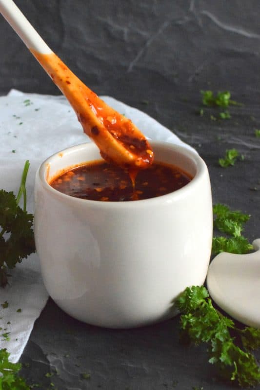 This hot and spicy sauce only has a scary name like Dragon Fire Sauce; it most certainly isn't blow-your-head-off hot - not in small amounts anyway! This sauce has so many uses and tastes great on so many things!  #dragonfire #hotsauce #gochujang #hotandspicy #chilies