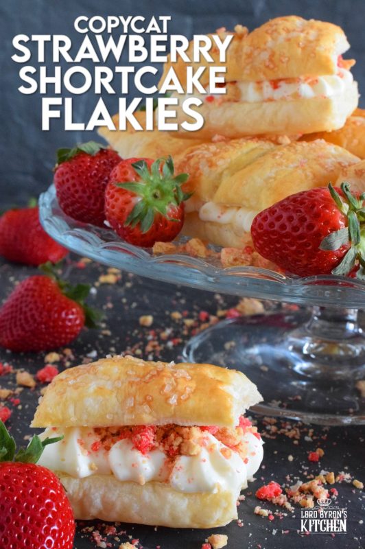 A deliciously creamy and sweet frosting is layered between a flaky and crispy puff pastry with strawberry shortcake crumbs and homemade strawberry jam. Copycat Strawberry Shortcake Flakies just might be better than the original store-bought version! Give them a try! #flakies #passionflakies #copycatrecipes #strawberryshortcake #strawberry #valentine #desserts