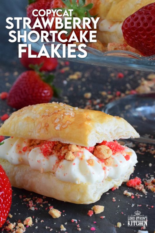 A deliciously creamy and sweet frosting is layered between a flaky and crispy puff pastry with strawberry shortcake crumbs and homemade strawberry jam. Copycat Strawberry Shortcake Flakies just might be better than the original store-bought version! Give them a try! #flakies #passionflakies #copycatrecipes #strawberryshortcake #strawberry #valentine #desserts