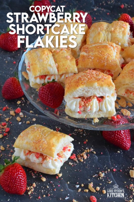A deliciously creamy and sweet frosting is layered between a flaky and crispy puff pastry with strawberry shortcake crumbs and homemade strawberry jam. Copycat Strawberry Shortcake Flakies just might be better than the original store-bought version! Give them a try! #flakies #passionflakies #copycatrecipes #strawberryshortcake #strawberry #valentine #desserts