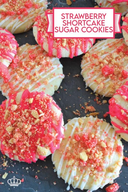 The uncomplicated and delicious sugar cookie gets a fresh, new flavour profile, and an upgrade in this Strawberry Shortcake Sugar Cookies recipe. A classic sugar cookie base is topped with a simple glaze and sprinkled with homemade shortcake crumbs. These would make a great giftable dessert idea for Valentine's Day! #sugarcookies #cookies #valentines #strawberry #shortcake