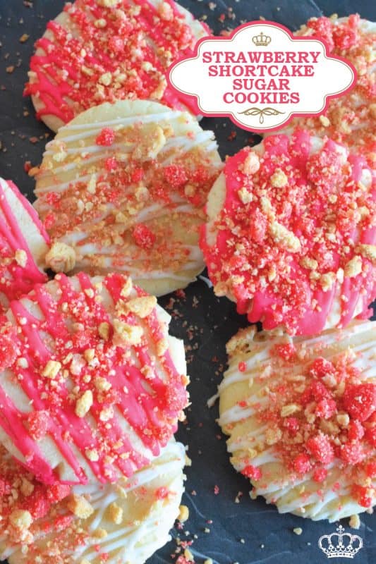 The uncomplicated and delicious sugar cookie gets a fresh, new flavour profile, and an upgrade in this Strawberry Shortcake Sugar Cookies recipe. A classic sugar cookie base is topped with a simple glaze and sprinkled with homemade shortcake crumbs. These would make a great giftable dessert idea for Valentine's Day! #sugarcookies #cookies #valentines #strawberry #shortcake