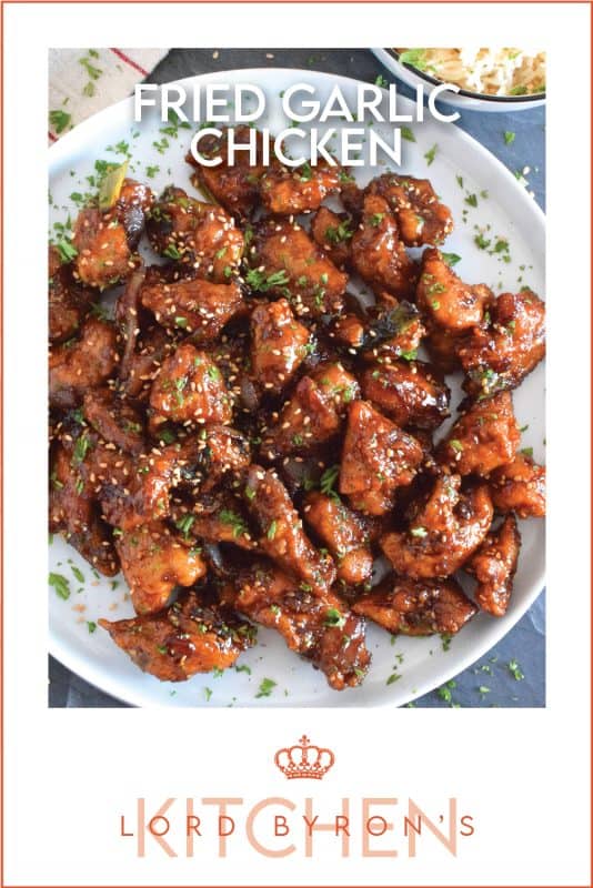 Fried Garlic Chicken is a crispy fried chicken in a thick and savoury garlic sauce; this dish is most certainly for the garlic lover. Prepared with a unique battering technique, and double fried, this chicken is sweet and super garlicky - it's made with twelve cloves of garlic! #garliclovers #garlicky #friedchicken #chicken #thighs