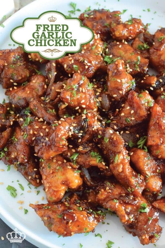 Fried Garlic Chicken is a crispy fried chicken in a thick and savoury garlic sauce; this dish is most certainly for the garlic lover. Prepared with a unique battering technique, and double fried, this chicken is sweet and super garlicky - it's made with twelve cloves of garlic! #garliclovers #garlicky #friedchicken #chicken #thighs