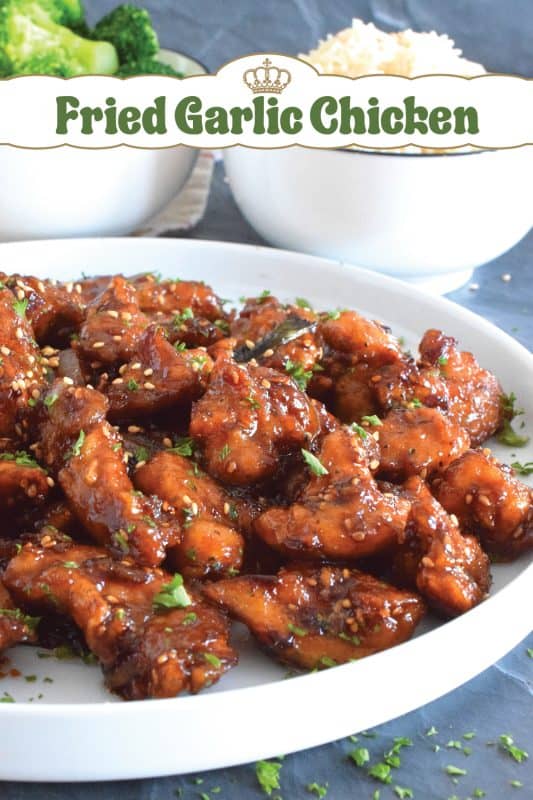 Fried Garlic Chicken is a crispy fried chicken in a thick and savoury garlic sauce; this dish is most certainly for the garlic lover. Prepared with a unique battering technique, and double fried, this chicken is sweet and super garlicky - it's made with twelve cloves of garlic! #garliclovers #garlicky #friedchicken #chicken #thighs