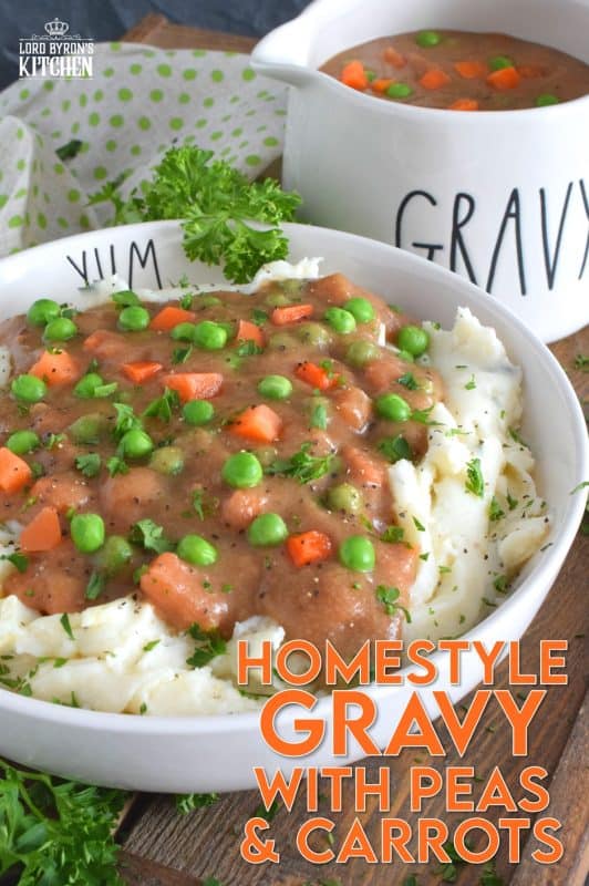 Thick or thin, the choice is yours, but when it comes to Homestyle Gravy with Peas and Carrots, I think thick is best! This easy to make from scratch gravy is deliciously savoury and a perfect vessel to suspend those buttered carrots and peas into! Pour liberally over mashed potatoes and dig in! #gravy #vegetarian #stpattysday #mashedpotatoes 