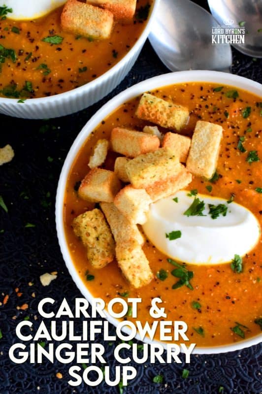 Warm and comforting, Roasted Carrot and Cauliflower Curry Ginger Soup is thick and creamy without the addition of dairy.  This is one of those soups that are good for you, but you won't care, because it is just so delicious! #cauliflower #curry #roasted #soup #soupson