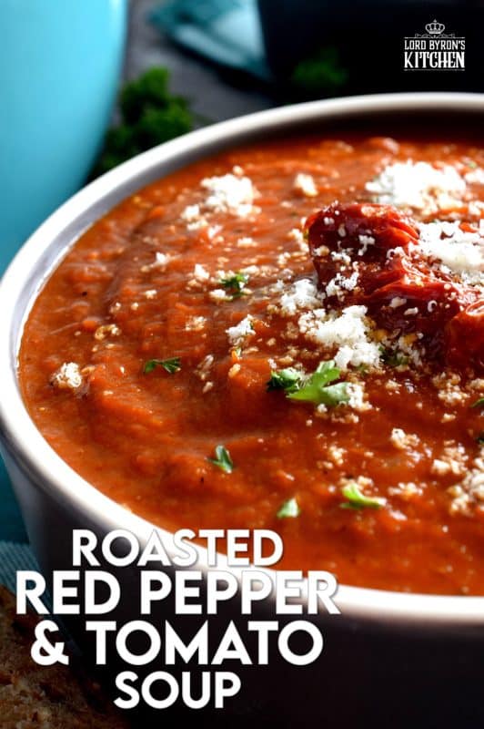 Roasting vegetables intensifies flavour and brings out their natural sweetness. The charred bits will add smokiness and a homestyle flair. It's certainly evident in this Roasted Red Pepper and Tomato Soup! This delicious soup is super thick and hearty; and easy to prepare too! #roasted #red #peppers #tomato #soup