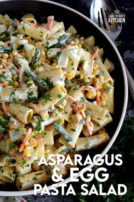Served cold or at room temperature, Asparagus and Egg Pasta Salad is a dish best served in late spring or early summer when fresh asparagus is readily available. Bring this dish to your next picnic or potluck and you'll surely be the belle of the ball! #asparagus #egg #salad #pasta #fresh #picnic #summer #potluck