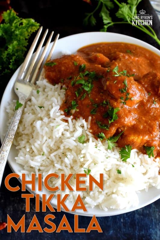 Tender chicken breast pieces, marinated in yogurt and spices, and simmered in a thick, luscious curry sauce. Why go out for Indian food when you can make Chicken Tikka Masala at home? Going out is so last year, anyway! #chicken #tikkamasala #indianchicken #indianathome #marinade #indianfood #indianrecipes