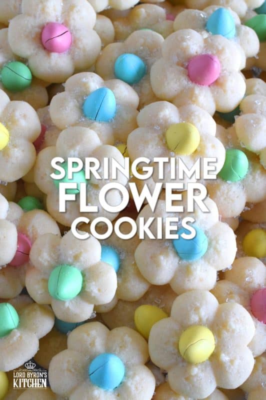 A good spritz cookie should taste slightly sweet and buttery. The cookie should be slightly crumbly, but not dry, and it should feel like it’s melting in your mouth. Topped with a single candy coated chocolate, these Springtime Flower Cookies are not only delicious, but pretty and cheerful too! #spritz #cookies #easter #spring #flower #cadbury #minieggs