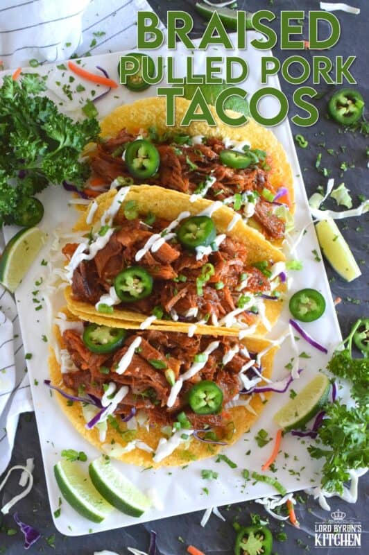 Moist and tender pork shoulder roast is braised in a rich and sweet tomato-based sauce with white wine, and brown sugar. The secret to these absolutely delicious Braised Pulled Pork Tacos is allowing the meat to cook slowly over low heat in a covered pan for multiple hours. Braising cannot be rushed and patience is greatly rewarded with just one bite of this deliciously savoury taco! #tacos #pulledpork #stovetop #castironcooking #dutchoven #porkshoulder #pork