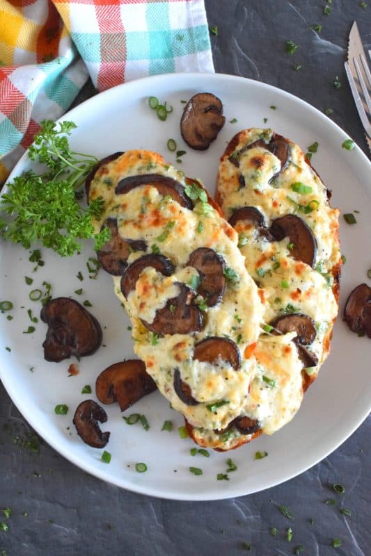 Sometimes you want something quick, easy, and filling. And, sometimes, you want something that is all of those things, as well as cheesy, messy, and loaded with carbs. Four Cheese Mushroom Toasts is just what you need! It’s one of those great weeknight dinners that just makes you feel all warm and cozy! #toast #mushroom #cheeses #cheesy