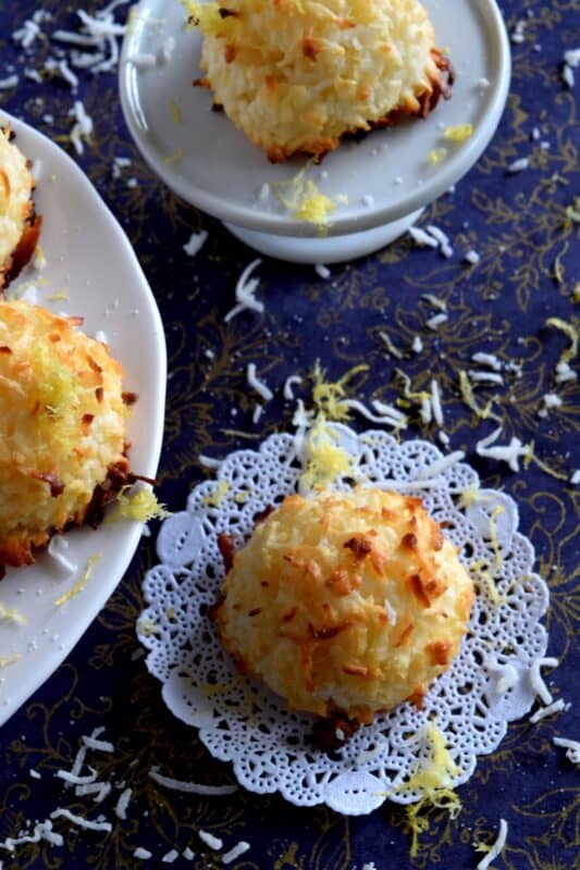 The popular Coconut Macaroon just got a whole lot better - with lemon!  Fresh lemon juice and zest gives this classic dessert a brand new taste and vibe; a perfect afternoon pick-me-up! This easy to make recipe comes together in less than 30 minutes so make them often! #macaroons #coconut #condensedmilk #lemon #zest