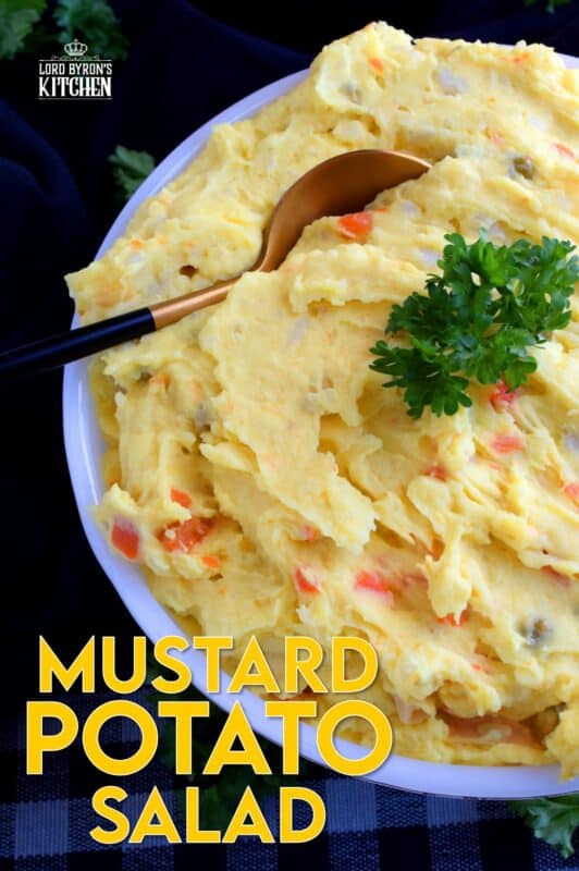 Mustard Potato Salad is very similar to regular potato salad, but with tang and zing from yellow mustard. Adding a vegetable medley consisting of peas, beans, corn, and carrots gives the salad more texture and flavour. Update your regular salad with a new flavour profile! #potato #salad #mustard #newfie #newfoundland #recipes