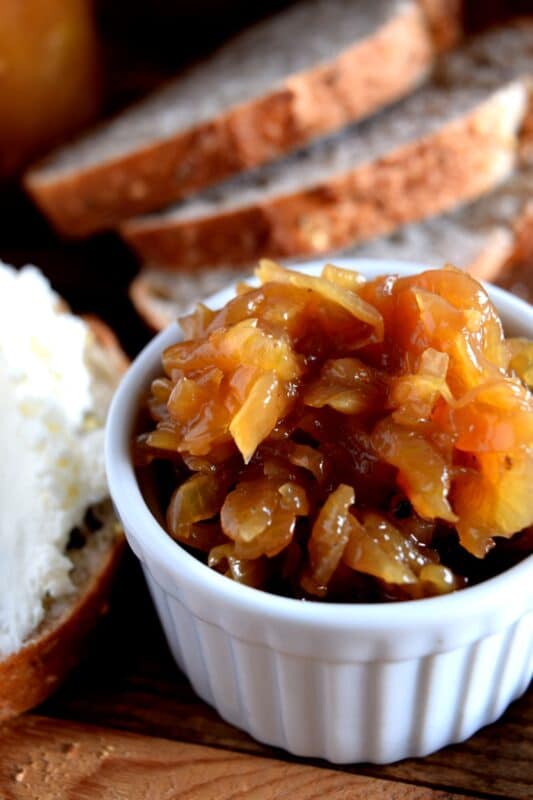 There are so many words one can use to describe the delicious taste of Preserved Onion Marmalade, but only one word is needed - perfection! The onions are caramelized in brown sugar, vinegar, and orange juice. You can use these on almost anything! #caramelized #canning #preserved #onions #marmalade