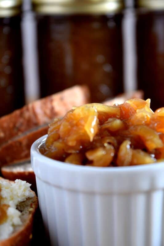 There are so many words one can use to describe the delicious taste of Preserved Onion Marmalade, but only one word is needed - perfection! The onions are caramelized in brown sugar, vinegar, and orange juice. You can use these on almost anything! #caramelized #canning #preserved #onions #marmalade