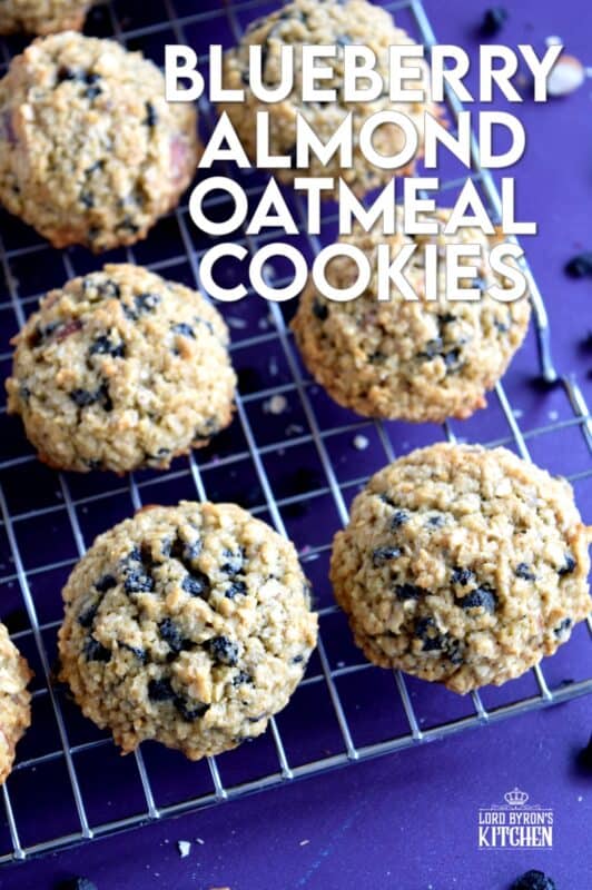 Blueberry Almond Oatmeal Cookies are my newest obsession!  Super tasty, super healthy, and super delicious, these chewy cookies make a perfectly guilt-free snack or treat. Filled with dried blueberries, chopped almonds, and quick oats, this cookie is both satisfying and filling! #blueberry #oatmealcookies #healthy #lowfat #driedberries