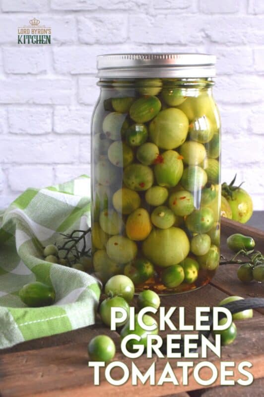 At the end of growing season, just before the first frost, harvest the last of those unripened cherry tomatoes and make a batch of Pickled Green Tomatoes! It's a shame to let them go to waste when you can make something so delicious in just a few minutes! #pickled #tomatoes #quickpickle #greentomatoes