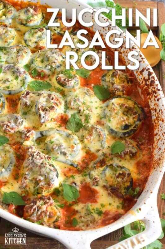 A little lighter on the carbs, Zucchini Lasagna Rolls are prepared by rolling thinly sliced zucchini with spinach, egg, three cheeses, and seasonings. Baked in marinara sauce, don't be fooled by this healthier dish; it is both filling and robust! #zucchini #zucchinirolls #lasagna #lasagnarolls #zucchinilasagna #lowcarb