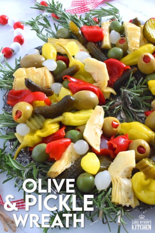 This bright and shiny edible wreath is packed full of sweet, salty, and tangy flavour! Consisting of your favourite pickled and marinated foods, an Olive and Pickle Wreath is the answer to every host's holiday appetizer table. Assemble on a platter and refrigerate until ready to serve. It's easy, delicious, and festive! #olives #pickles #charcuterie #christmas #holiday #partyfood