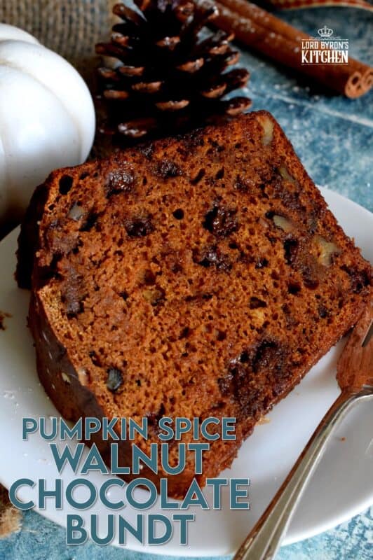 Perfectly moist and decadent on its own, but can be dressed to impress with a scoop of ice cream and some caramel drizzle. Pumpkin Spice Walnut Chocolate Bundt cake is a big cake and it's perfect for sharing! #pumpkinspice #pumpkin #spice #walnut #chocolate #bundt #cake #bundtbakers