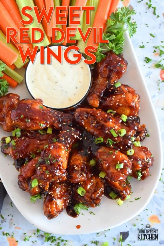 In this recipe, chicken wings are baked until golden brown and crispy and then they're tossed in a hot and spicy homemade sauce which is prepared in just a few minutes. Sweet Red Devil Wings are perfectly cooked and drenched in a thick, sticky sauce that I just can't get enough of! #sweetandsticky #wings #chicken #sauce
