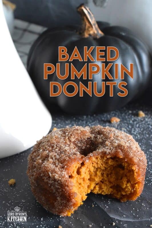 The softest and moistest Baked Pumpkin Donuts ever are right here! Prepared with both pumpkin puree and a homemade pumpkin spice blend, these donuts are the best pumpkin-flavoured donuts you'll ever eat! They are brushed with melted butter and rolled in a cinnamon sugar coating. It's a good thing each batch makes 18 donuts because they disappear quite quickly! #donuts #pumpkin #pumpkinpuree #pumpkinspice #baked