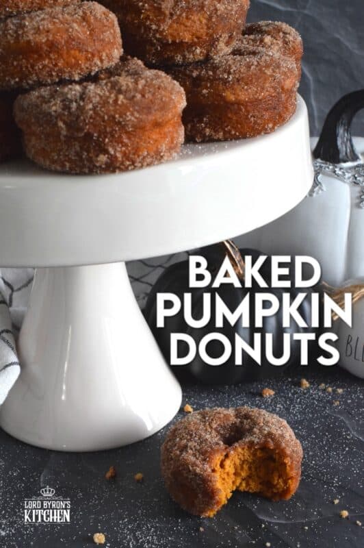 The softest and moistest Baked Pumpkin Donuts ever are right here! Prepared with both pumpkin puree and a homemade pumpkin spice blend, these donuts are the best pumpkin-flavoured donuts you'll ever eat! They are brushed with melted butter and rolled in a cinnamon sugar coating. It's a good thing each batch makes 18 donuts because they disappear quite quickly! #donuts #pumpkin #pumpkinpuree #pumpkinspice #baked