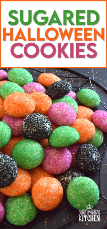 Just in time for the little trick-or-treaters in your life, these melt-in-your-mouth orange, green, purple, and black cookies are about to become everyone's favourite Halloween treat! Sugared Halloween Cookies are made with just five ingredients, and they're quick and easy too! #halloween #cookies #sugar #sanding #orangeandblack