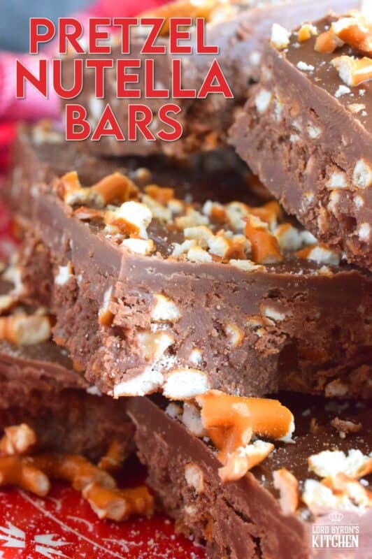 Nutella is very popular in most families, especially families with kids.  Pretzel Nutella Bars combines the nutty and creamy chocolatey-ness that is Nutella with the crunchiness and saltiness of pretzels.  And, if that wasn't enough, the bars are topped with melted Mirage Candy Bars!   #nutella #candybar #chocolate #bars #nobake