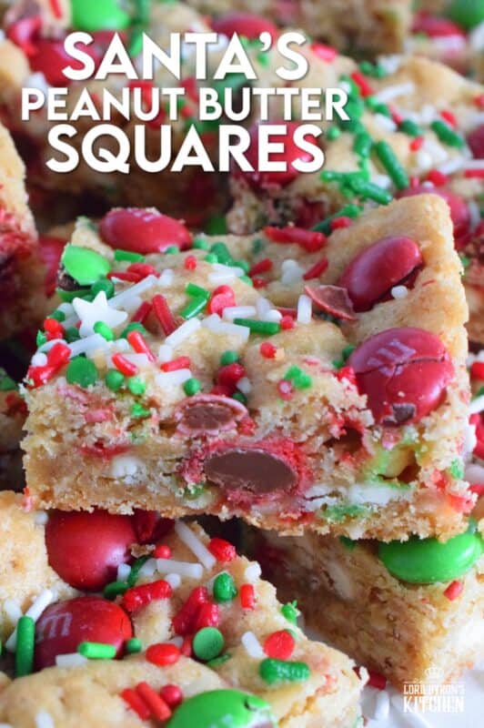 If you want extra presents under the tree this year, leave a couple of these Santa's Peanut Butter Squares with a tall glass of milk on the mantle this Christmas Eve! Loaded with sprinkles, M&Ms, white chocolate chips, peanut butter, and more, who wouldn't want to sink their teeth into this festive treat!? #holidaybars #m&ms #cookies #christmas #baking