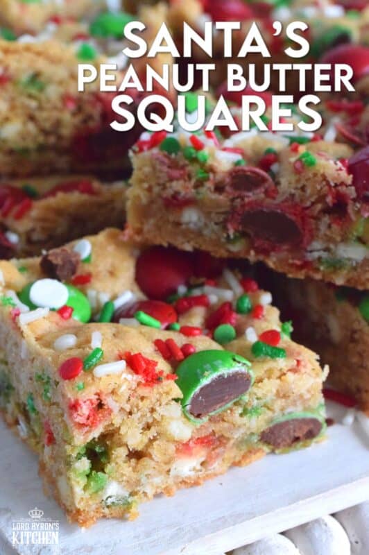 If you want extra presents under the tree this year, leave a couple of these Santa's Peanut Butter Squares with a tall glass of milk on the mantle this Christmas Eve! Loaded with sprinkles, M&Ms, white chocolate chips, peanut butter, and more, who wouldn't want to sink their teeth into this festive treat!? #holidaybars #m&ms #cookies #christmas #baking