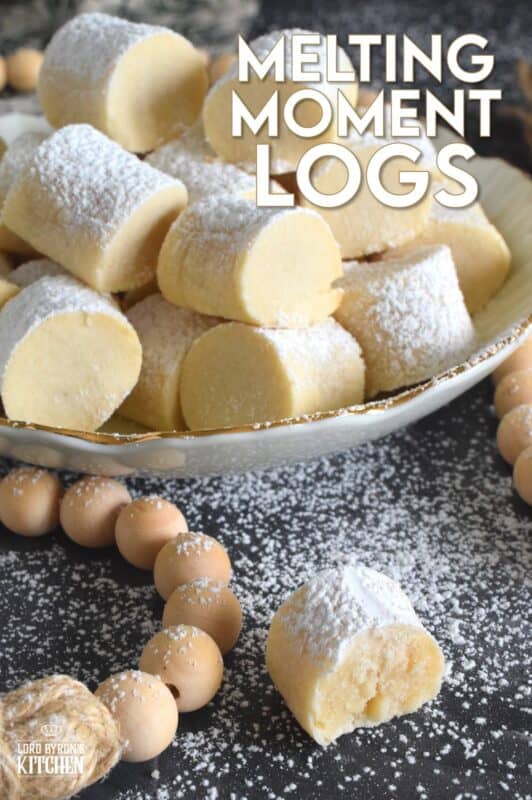 These light and fluffy cookies are prepared with cornstarch, which is what gives them that melt-in-your-mouth texture.  Simply flavoured with a bit of vanilla extract, confectioner's sugar, and butter, Melting Moment Logs are easy to prepare and must be featured in your holiday baking this year! #melting #meltingmoments #cookies #holiday #baking