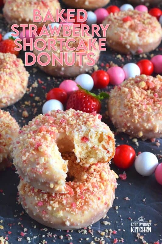 Baked Strawberry Shortcake Donuts are prepared with homemade strawberry shortcake crumbs! Baked to perfection in only 10 minutes, glazed and topped with more shortcake crumbs, these donuts are super soft and moist and very cake-like inside. Share these with your favourite valentine or save them all for yourself! #strawberry #donuts #doughnuts #valentine