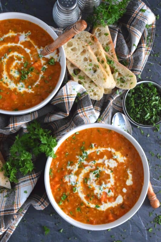 Thick and hearty, Carrot and Red Lentil Soup is good for you too!  Completely vegetarian and vegan, this soup is super easy to prepare and is just what is needed to get you through the last stretch of winter.  Make a big batch because this soup freezes and reheats very well! #soup #lentils #vegetarian #carrot #vegan