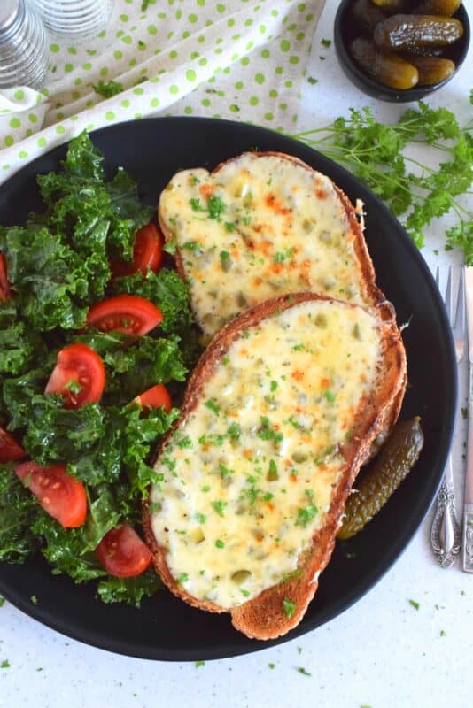 Otherwise known as cheese toast, rarebit is prepared with cheese sauce rather than cheese slices like the popular North American grilled cheese.  Irish Gherkin Rarebit has pickles too, which is why it just might be my favourite! Cheap and easy, serve these with a side salad and extra gherkins for a complete meal! #rarebit #irish #ireland #stpatricksday #gherkin #cornichon