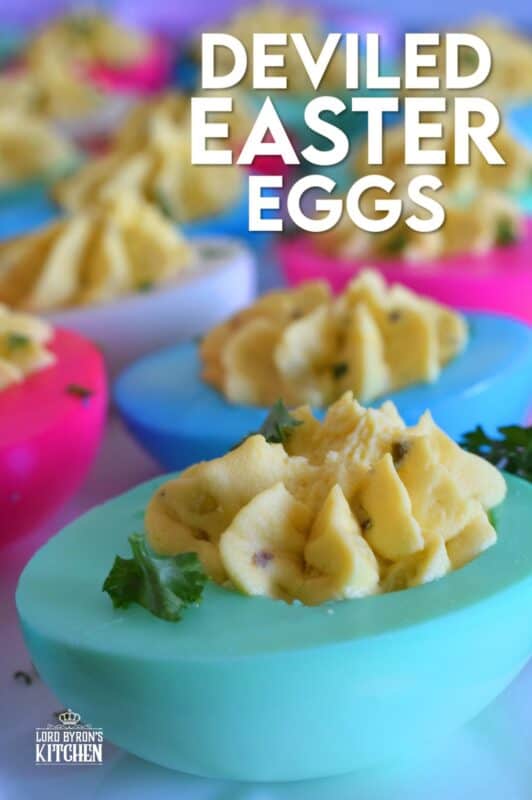 Easter isn't Easter without boiled eggs, so why not have some fun and make a batch of very Easter-y and very colourful Deviled Easter Eggs!? Don't hide these around the house and give the Easter Bunny all the credit! #deviledeggs #eastereggs #easter #deviled #boiledeggs #dyedeggs