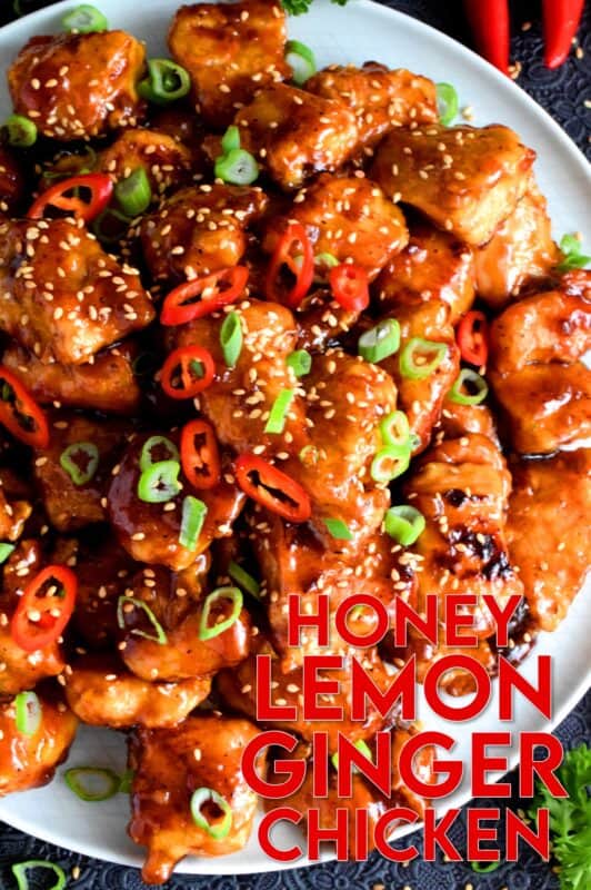 Tender pieces of chicken glazed in a thick, sweet, sour, and tangy sauce. Perfectly moist and juicy, Honey Lemon Ginger Glazed Chicken is a dish that's sure to get everyone to the dinner table. Asian-inspired dishes like this are not complicated and are so much better than takeout! #honeylemon #honeyginger #gingerchicken #asianfood #glazed #stickychicken #chicken