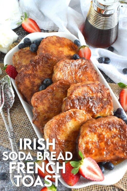Homemade Irish Soda Bread is a quick-bake bread with no yeast, which makes it a dense bread, yet it's still very light and airy.  Soaking the slices in an egg mixture and pan-frying them in butter makes for a deliciously wonderful St. Patrick's Day breakfast!  You have got to try this Irish Soda Bread French Toast; you will not be disappointed! #frenchtoast #sodabread #stpatricksday #irish